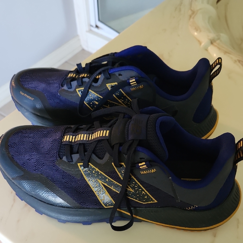 Men's New Balance Blue and Gold Athletic Shoes with Performance Design